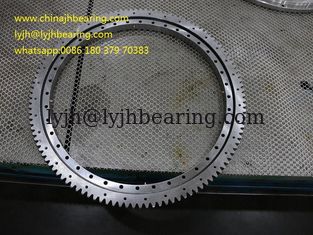 Cina VSA200844 milik Four point contact Slewing bearing 950.1X772XD56 mm dalam stok pemasok